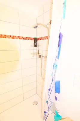 Ein Badezimmer in der Unterkunft New West Station