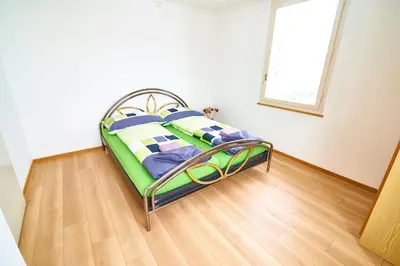 Ein Bett oder Betten in einem Zimmer der Unterkunft New West Station