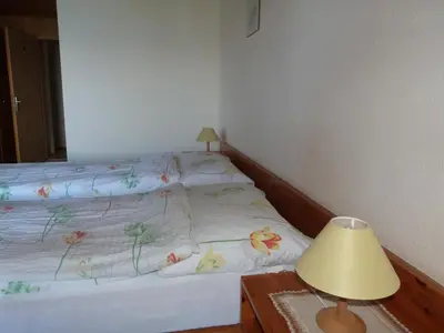 Ein Bett oder Betten in einem Zimmer der Unterkunft Hotel Bellevue