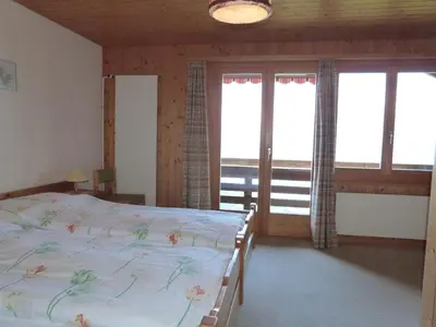 Ein Bett oder Betten in einem Zimmer der Unterkunft Hotel Bellevue