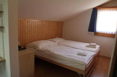 Ein Bett oder Betten in einem Zimmer der Unterkunft Chalet Felderhof