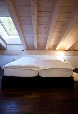 Ein Bett oder Betten in einem Zimmer der Unterkunft Chalet Altesse - Premium Apartments