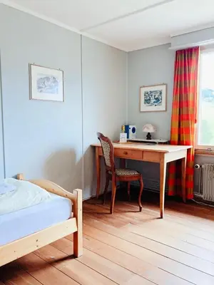 Ein Bett oder Betten in einem Zimmer der Unterkunft Hotel Gletscherblick