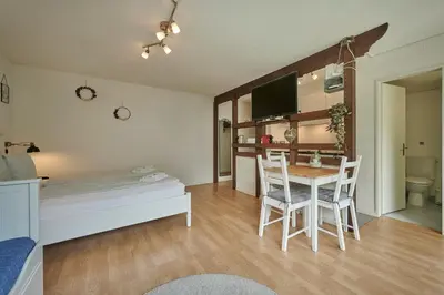 Ein Bett oder Betten in einem Zimmer der Unterkunft Stay Switzerland Apartments