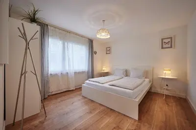 Ein Bett oder Betten in einem Zimmer der Unterkunft Stay Switzerland Apartments