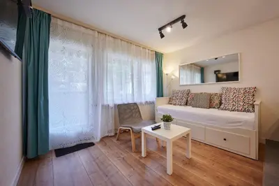 Ein Bett oder Betten in einem Zimmer der Unterkunft Stay Switzerland Apartments