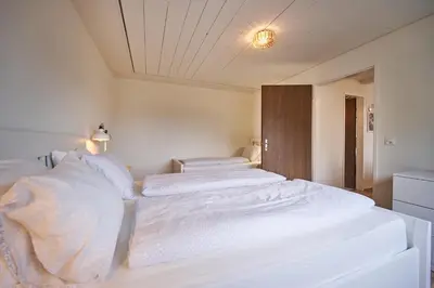 Ein Bett oder Betten in einem Zimmer der Unterkunft Stay Switzerland Apartments