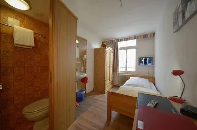 Ein Badezimmer in der Unterkunft Swiss Lodge Hotel Bernerhof