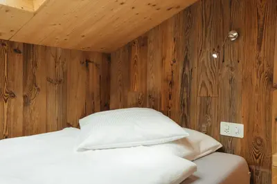 Ein Bett oder Betten in einem Zimmer der Unterkunft Hotel Matterhornblick