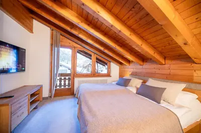 Ein Bett oder Betten in einem Zimmer der Unterkunft Hotel AMBiANCE