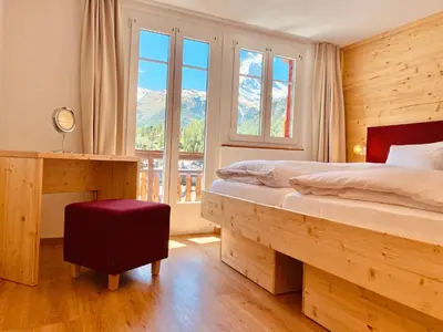 Ein Bett oder Betten in einem Zimmer der Unterkunft Hotel Capricorn