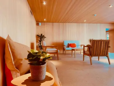 Ein Sitzbereich in der Unterkunft Hotel Capricorn