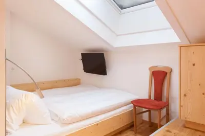 Ein Bett oder Betten in einem Zimmer der Unterkunft Hotel Capricorn