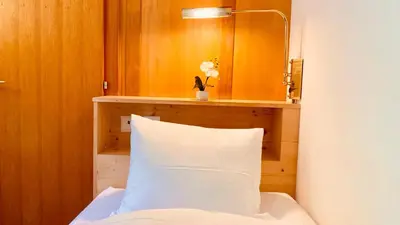 Ein Bett oder Betten in einem Zimmer der Unterkunft Hotel Capricorn