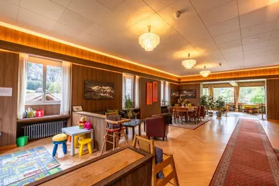 Ein Sitzbereich in der Unterkunft Hotel Staubbach