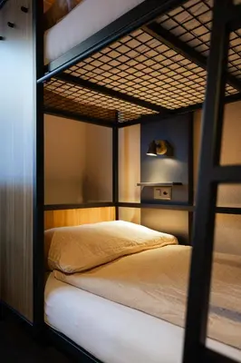 Ein Bett oder Betten in einem Zimmer der Unterkunft Eiger Lodge Easy