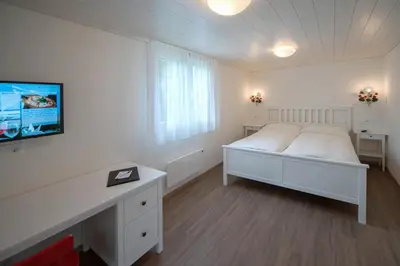 Ein Bett oder Betten in einem Zimmer der Unterkunft Beausite Apartments