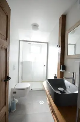 Ein Badezimmer in der Unterkunft Jungfrau Family Holiday Home