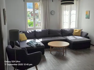 Ein Sitzbereich in der Unterkunft Jungfrau Family Holiday Home