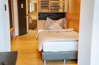 Ein Bett oder Betten in einem Zimmer der Unterkunft Hotel Eden Wellness