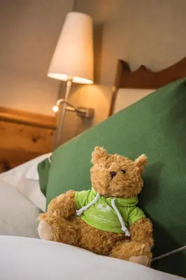 Ein Bett oder Betten in einem Zimmer der Unterkunft Riffelalp Resort 2222m Ski-in & Ski-out