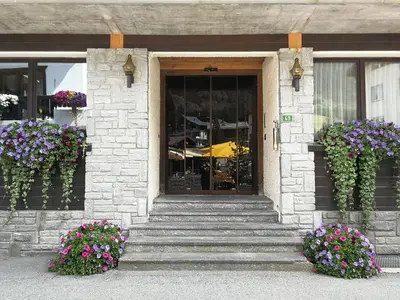 Eine Fassade oder ein Eingang zu Ambiente Mountain Style