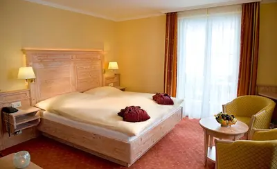 Ein Bett oder Betten in einem Zimmer der Unterkunft Hotel Restaurant Waldhaus