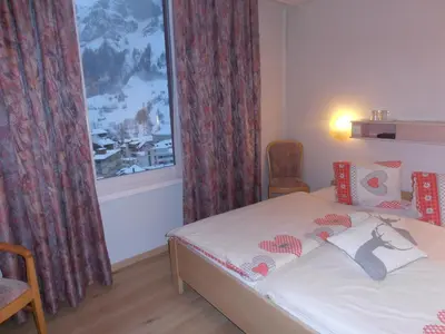 Ein Bett oder Betten in einem Zimmer der Unterkunft Hotel Restaurant Escher