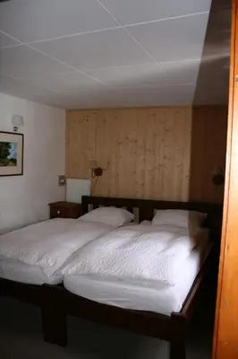 Ein Bett oder Betten in einem Zimmer der Unterkunft Hotel de la Sage