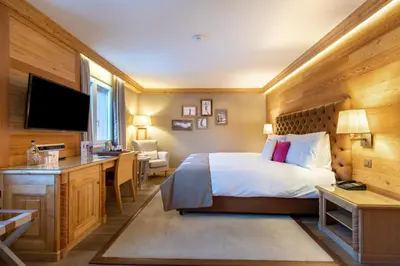 Ein Bett oder Betten in einem Zimmer der Unterkunft Hotel Royal