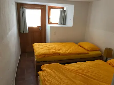 Ein Bett oder Betten in einem Zimmer der Unterkunft Rustici Maggia