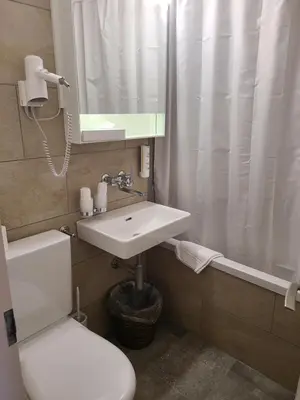 Ein Badezimmer in der Unterkunft Hotel Residence