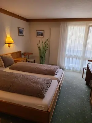 Ein Bett oder Betten in einem Zimmer der Unterkunft Hotel Residence