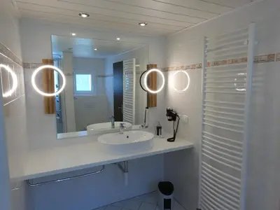 Ein Badezimmer in der Unterkunft Hotel Eden