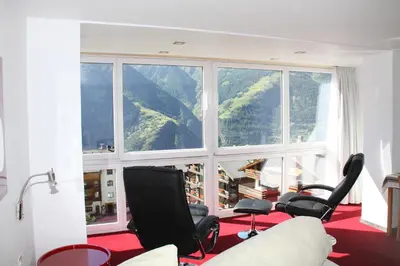 Ein Sitzbereich in der Unterkunft Hotel Eden