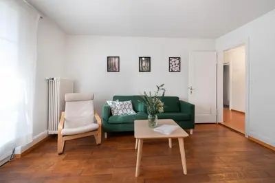 Ein Sitzbereich in der Unterkunft Interlaken Apartments