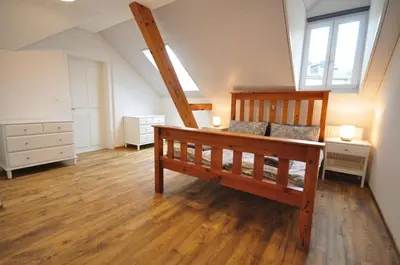 Ein Bett oder Betten in einem Zimmer der Unterkunft Interlaken Central 4