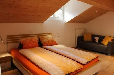 Ein Bett oder Betten in einem Zimmer der Unterkunft Haus Dorf 7