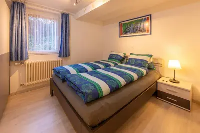Ein Bett oder Betten in einem Zimmer der Unterkunft Chalet Ramona