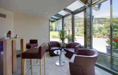 Ein Sitzbereich in der Unterkunft Aparthotel Helvetia
