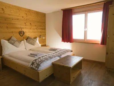 Ein Bett oder Betten in einem Zimmer der Unterkunft Hotel Aletschhorn