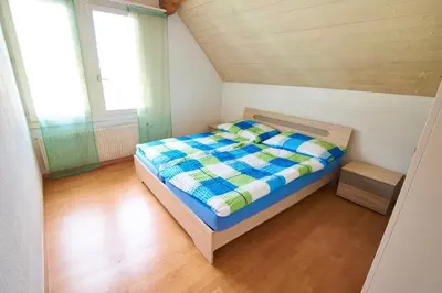 Ein Bett oder Betten in einem Zimmer der Unterkunft New West Station 7