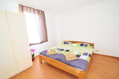 Ein Bett oder Betten in einem Zimmer der Unterkunft New West Station 7