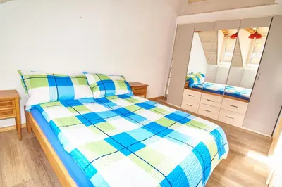 Ein Bett oder Betten in einem Zimmer der Unterkunft New West Station 7