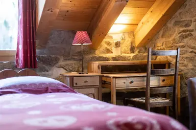 Ein Bett oder Betten in einem Zimmer der Unterkunft Aiguille de La Tza