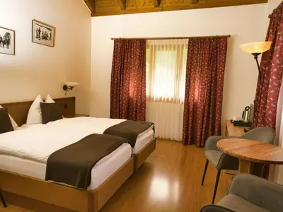 Ein Bett oder Betten in einem Zimmer der Unterkunft Hotel Massa