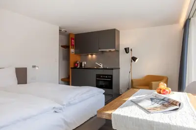 Ein Bett oder Betten in einem Zimmer der Unterkunft Chalet Annelis Apartments