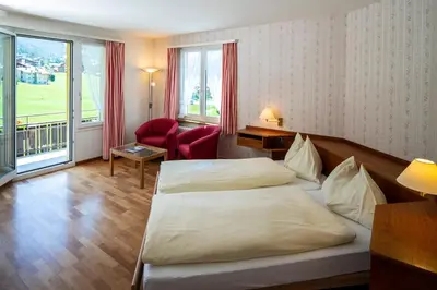 Ein Bett oder Betten in einem Zimmer der Unterkunft Hotel Berghaus