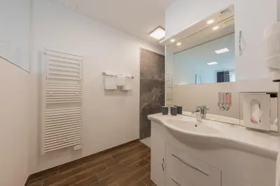 Ein Badezimmer in der Unterkunft Hotel Blattnerhof