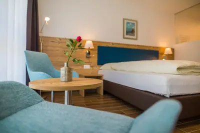 Ein Bett oder Betten in einem Zimmer der Unterkunft Hotel Blattnerhof